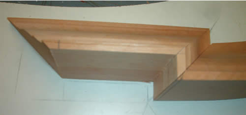 Installiing crown molding: checking for square.